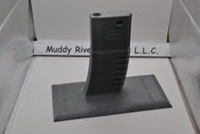 Load image into Gallery viewer, Get the stand personalized with what wording you would like. Easily store or display your Airsoft gun Compatible with most Airsoft rifles that uses regular M4 / M16 Airsoft AEG Magazines EMG Logo printed on stand These 3D printed items may need some sanding and could be rough from the printing process, the roughness will not hinder functionality.