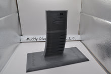 Load image into Gallery viewer, Get the stand personalized with what wording you would like. Easily store or display your Airsoft gun Compatible with most Airsoft rifles that uses regular M4 / M16 Airsoft AEG Magazines EMG Logo printed on stand These 3D printed items may need some sanding and could be rough from the printing process, the roughness will not hinder functionality.