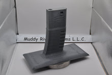 Load image into Gallery viewer, Get the stand personalized with what wording you would like.  Easily store or display your Airsoft gun Compatible with most Airsoft rifles that uses regular M4 / M16 Airsoft AEG Magazines EMG Logo printed on stand These 3D printed items may need some sanding and could be rough from the printing process, the roughness will not hinder functionality.
